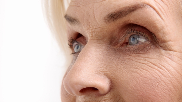 Close up of an elderly woman's blue eyes