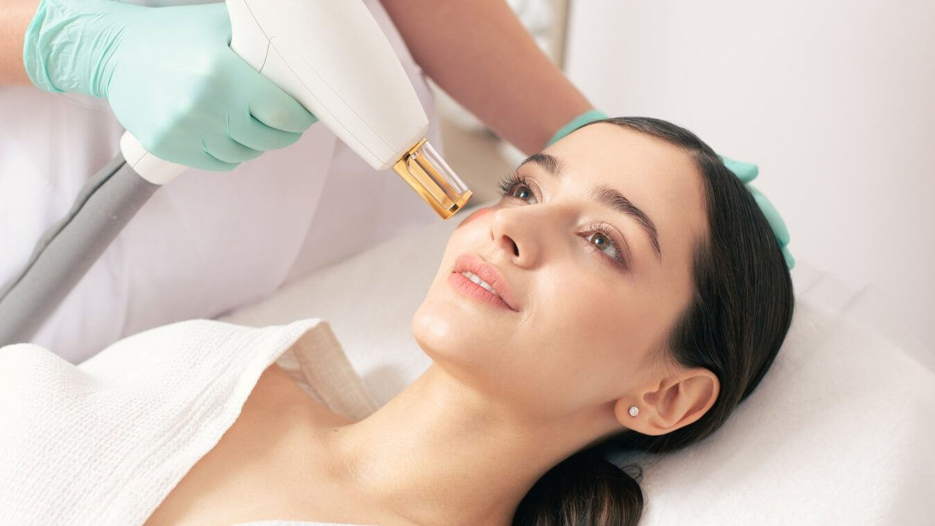 woman getting laser skin tightening treatment