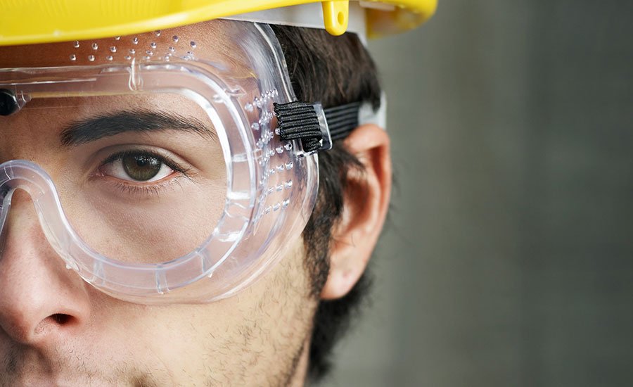 guy wearing construction glasses as protection