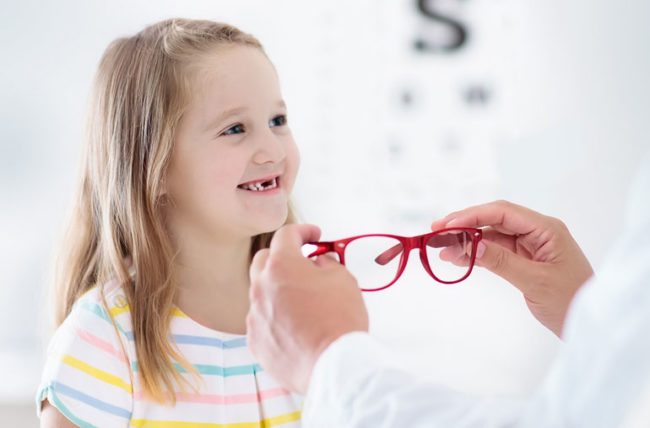 child exam with glasses