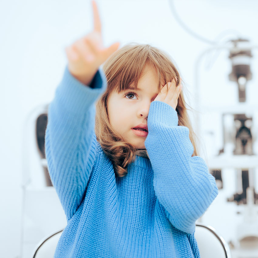 Cute-Little-Girl-Covering-One-Eye-During-Ophthalmological-Consult