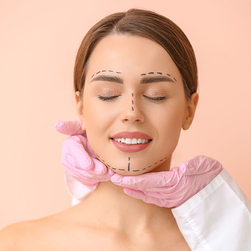 Plastic-surgeon-touching-face-of-young-woman-on-color-background