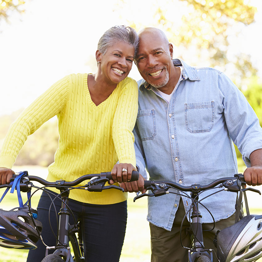 Senior-Couple-On-Cycle-Ride-In-Countryside