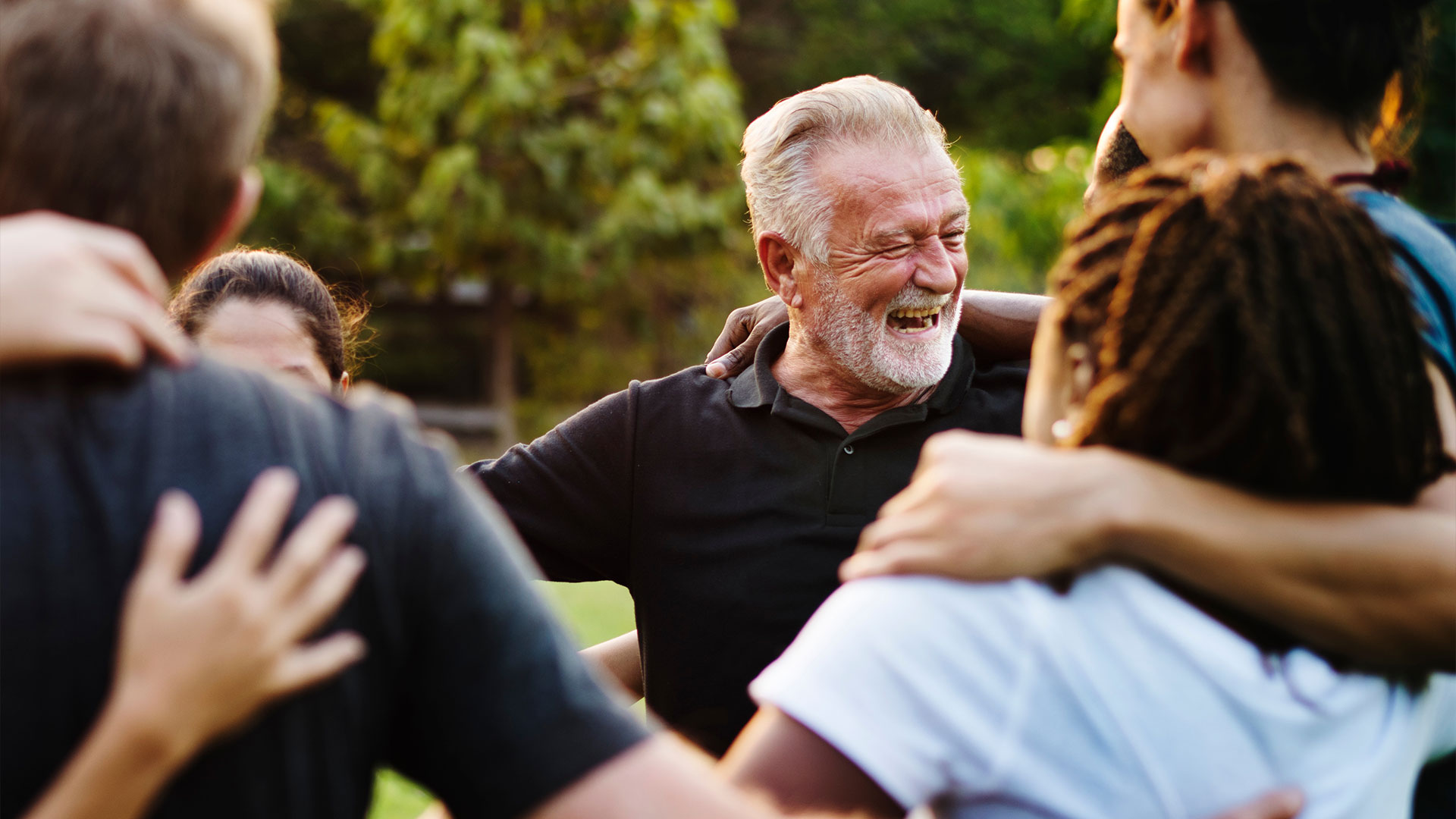 Happiness-group-of-people-huddle-and-smiling-together