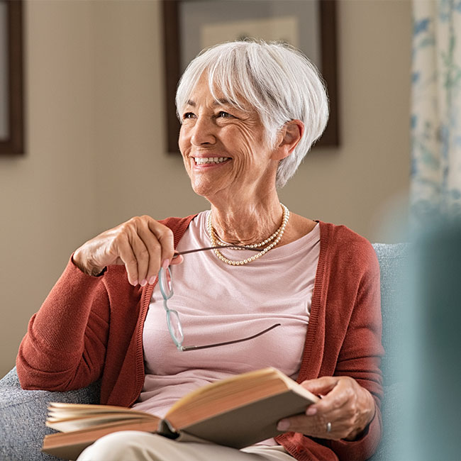 Happy-senior-woman-smiling-at-home-2