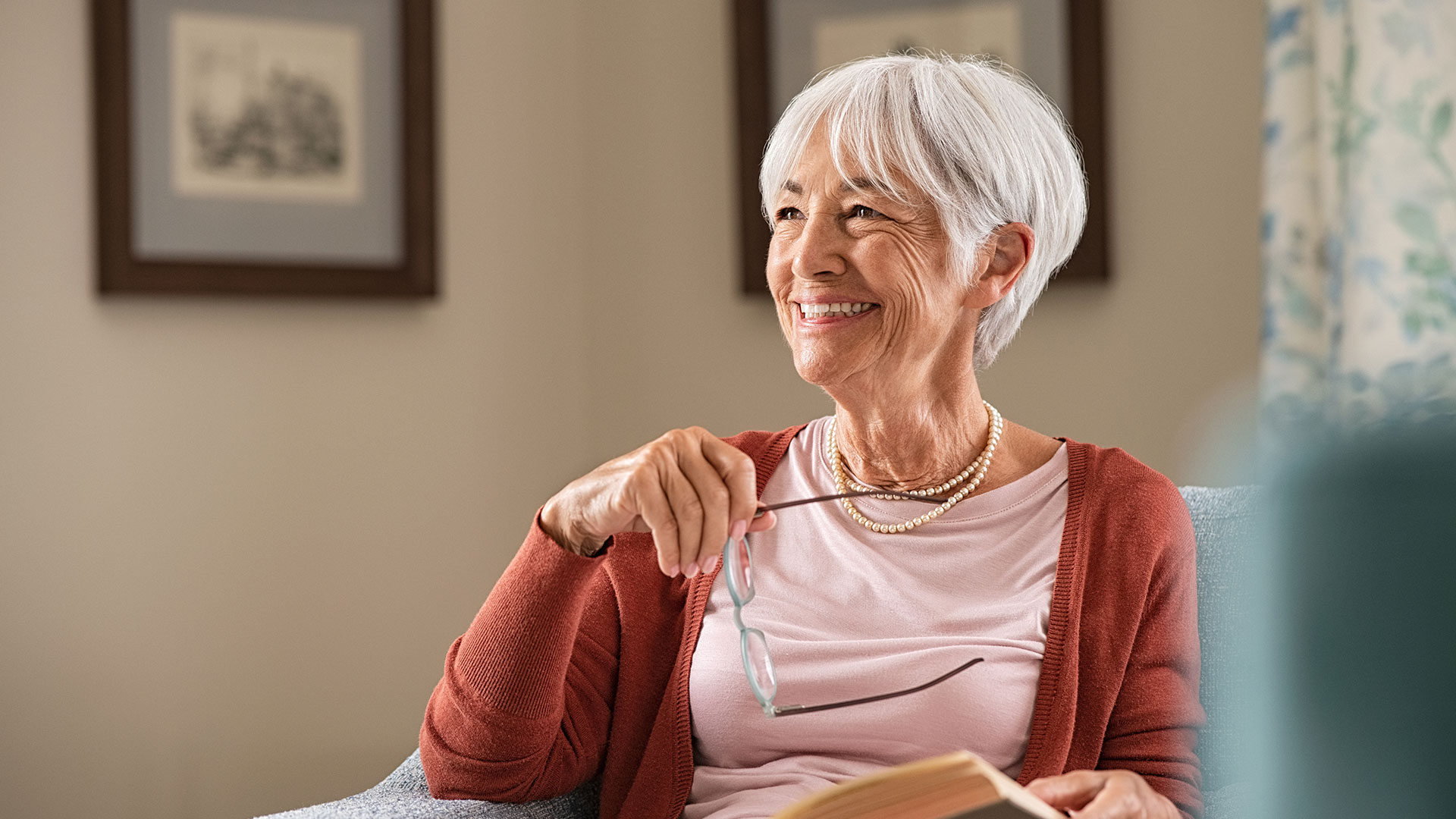 Happy-senior-woman-smiling-at-home