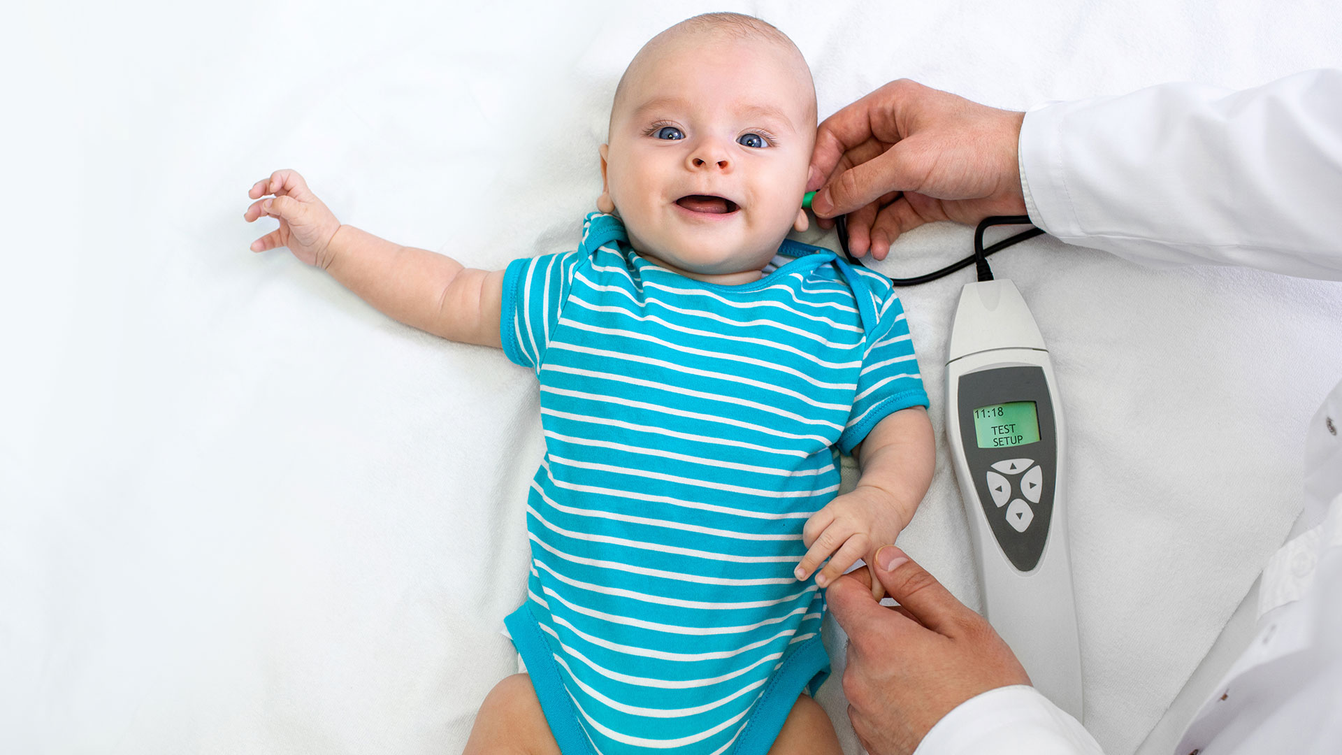 Newborn-hearing-screening-and-diagnosis-at-the-hospital.-Baby-having-hearing-screening,-Otoacoustic-Emissions