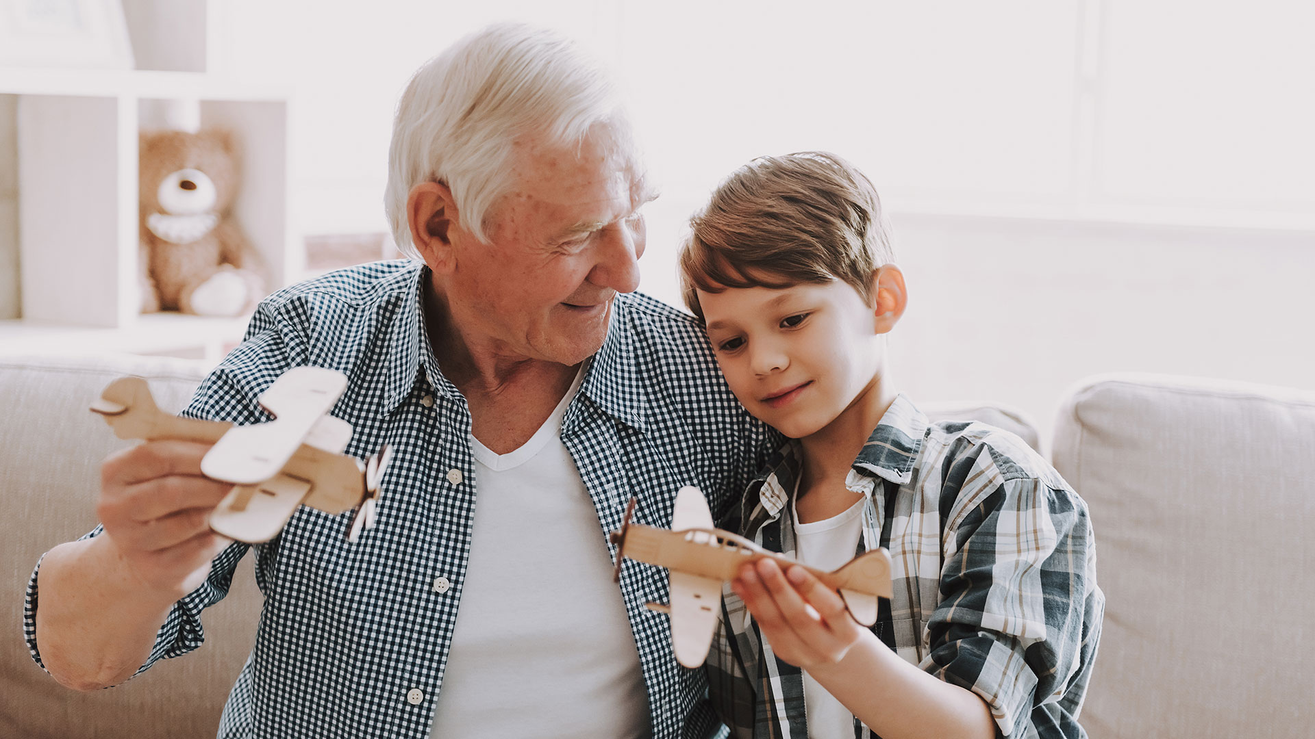 Portrait-Grandpa-and-Grandson-Playing-with-Toys