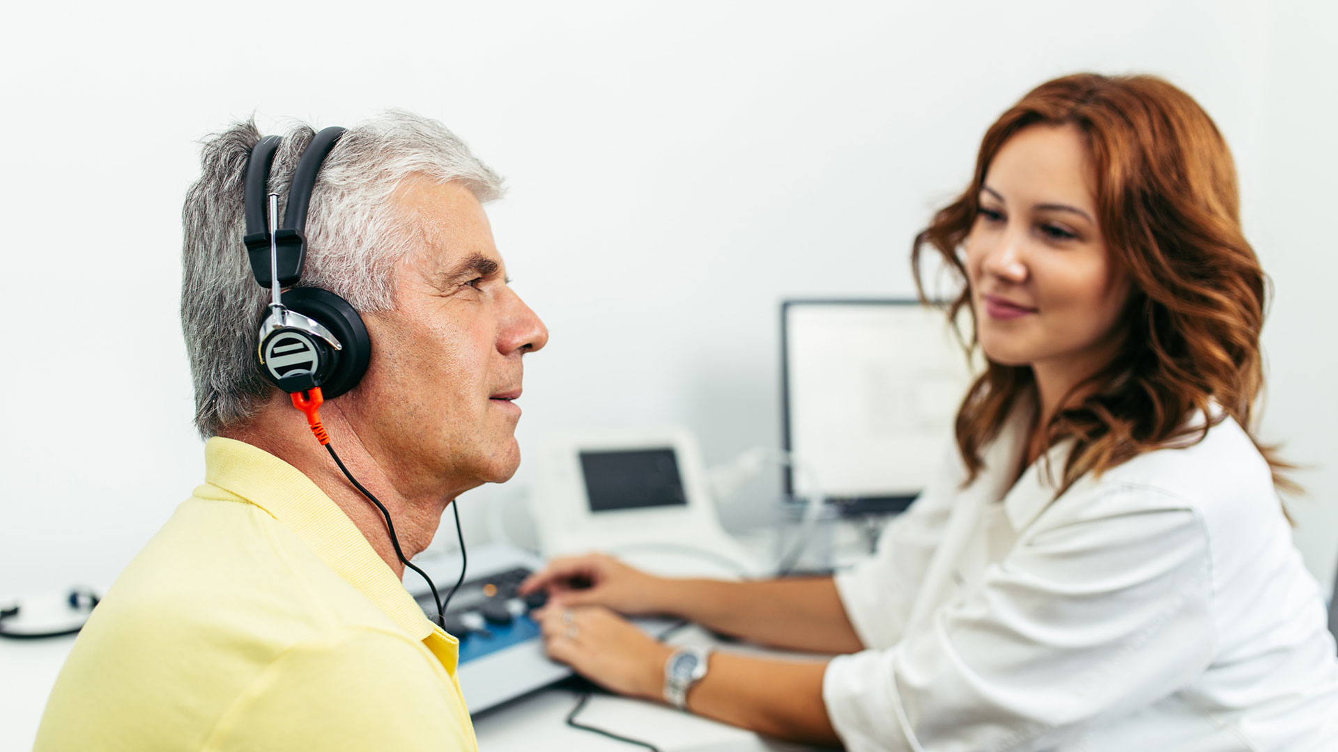 Senior-man-at-medical-examination-or-checkup-in-otolaryngologist's-office