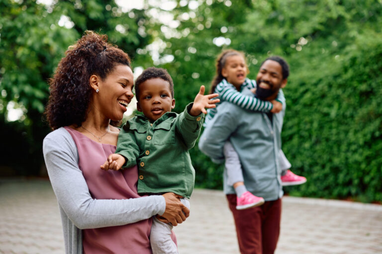 Happy smiling family on a nature walk.