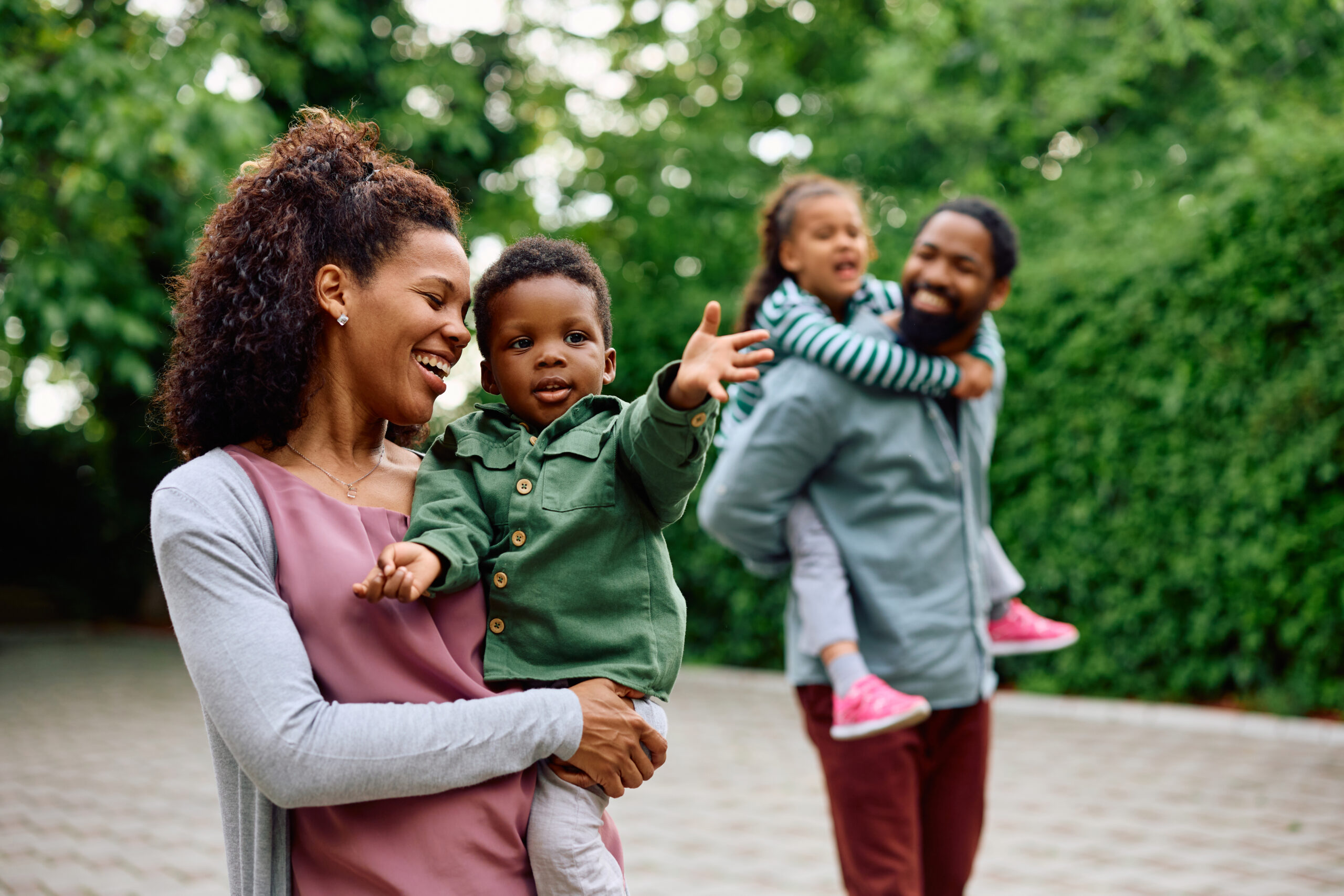 Happy smiling family on a nature walk.